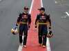 TORO ROSSO STR4, BARCELONA, SPAIN - MARCH 09:  Drivers Sebastian Bourdais (R) e Sebastien Buemi of team Toro Rosso walk down the pit lane during the unveiling of their new car the STR 4 at the Circuit de Catalunya on March 9, 2009 in Barcelona, Spain.  (Photo by Jasper Juinen/Getty Images)